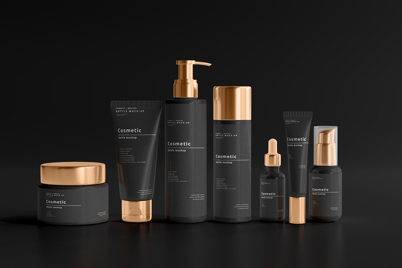A group of black and gold products on a black surface
