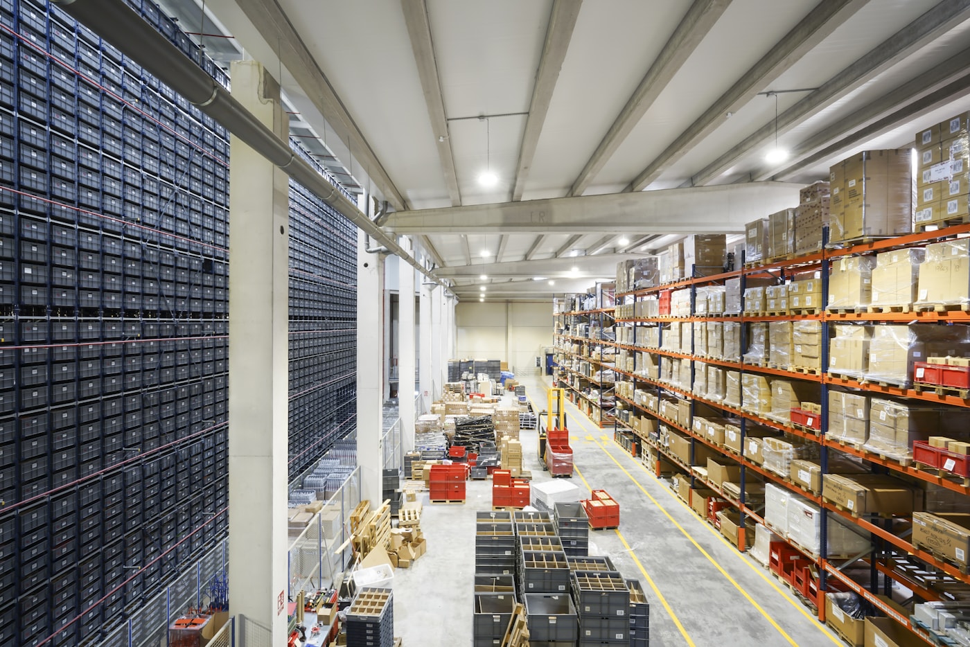 A large warehouse filled with lots of boxes